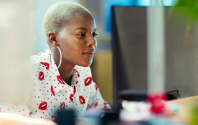 Woman in front of laptop